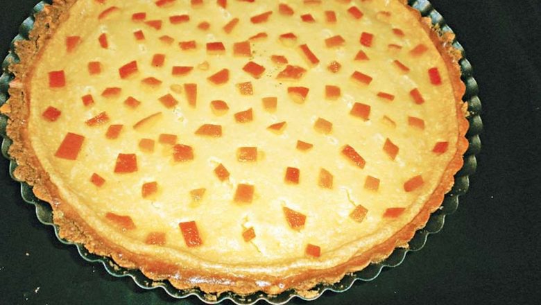Rețeta câștigătoare: Cheesecake cu portocală confiată – O incursiune în arta culinară și tradițiile gastronomice